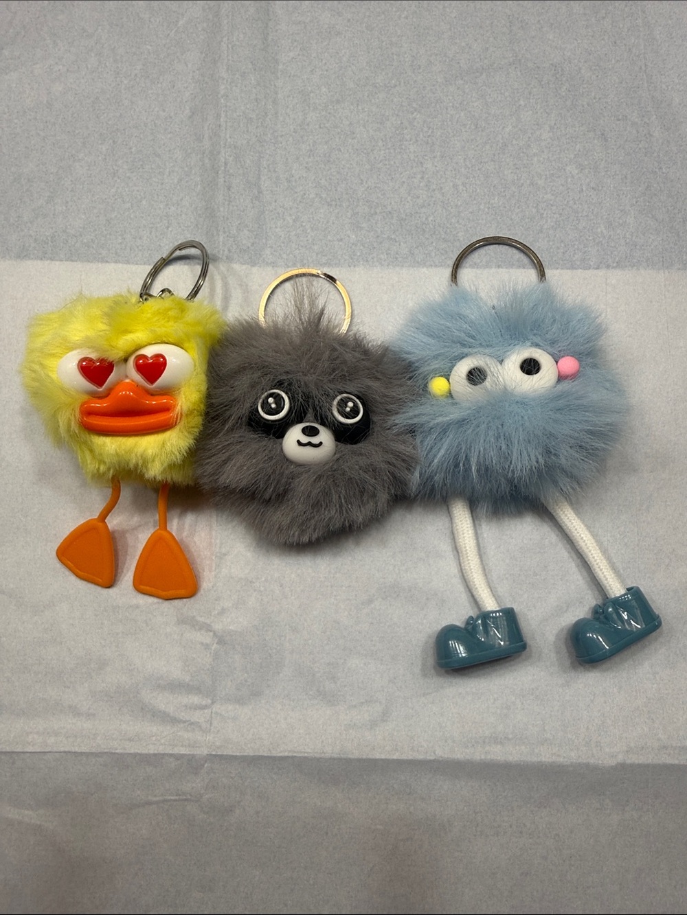 Fuzzy Pom Trio Keychain Set - Yellow, Gray & Blue - Picture 1 of 1